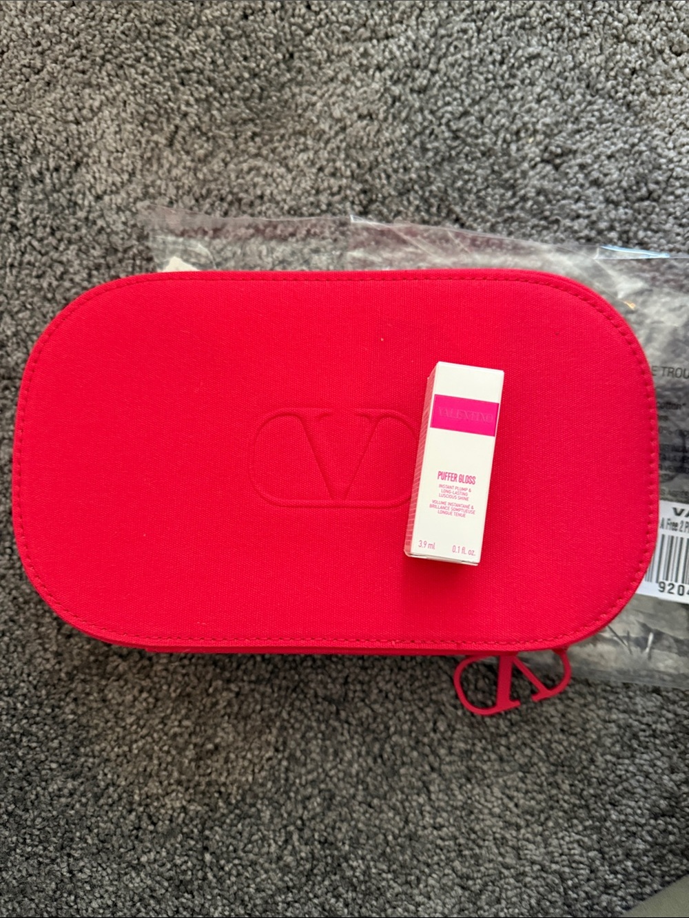 Valentino red embossed V zip pouch